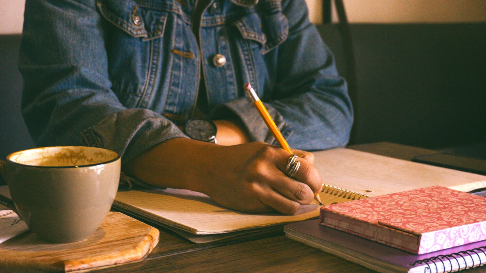 Man writing down blog post ideas